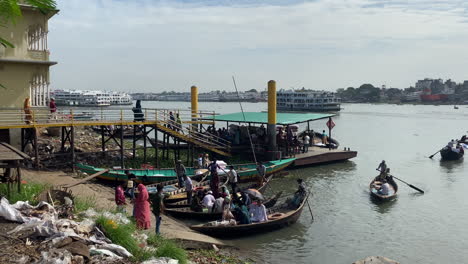 Wooden-boats-are-sailing-with-passengers-in-buriganga-river