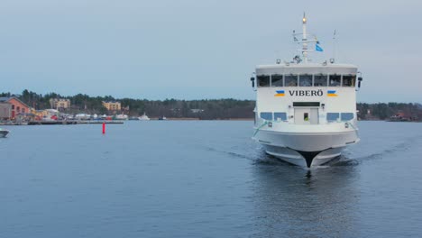 Passenger-Ferry-Boat-Arriving-At-Terminal-Near-Vaxholm-Fortress-In-Sweden