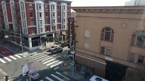 Aerial-view-away-from-the-Fillmore-club,-in-SF,-CA,-USA---pull-back,-drone-shot
