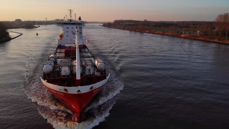 View-Of-Forward-Bow-Of-A2B-Ambition-Cargo-Vessel-Travelling-Along-Oude-Maas-Against-Sunset-Skies