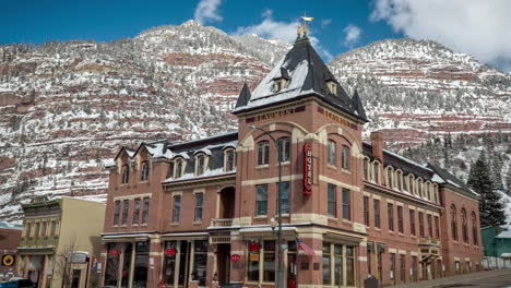 Time-Lapse,-Ouray-Downtown-at-Winter,-Colorado-USA,-Clouds-Moving-Above-Summits-and-Beaumont-Hotel