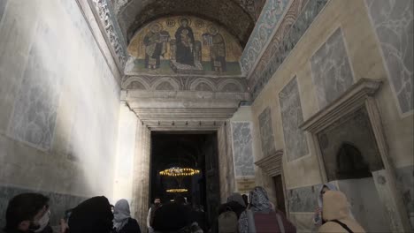 Tilt-shot-for-the-entrance-of-Holy-Hagia-Sophia-Grand-Mosque,-officially-known-as-the-Holy-Hagia-Sophia-Grand-Mosque,-and-formerly-the-Church-of-Hagia-Sophia-in-turkrey-Istanbul-01-03-2022