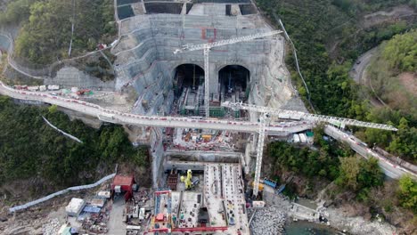 Hong-Kong-cross-bay-link-construction-project,-a-dual-two-lane-bridge-connecting-Tseung-Kwan-O-Lam-Tin-Tunnel-to-Wan-Po-Road,-Aerial-view