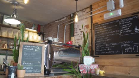 Chalkboards-And-Coffee-Machine-At-The-Counter