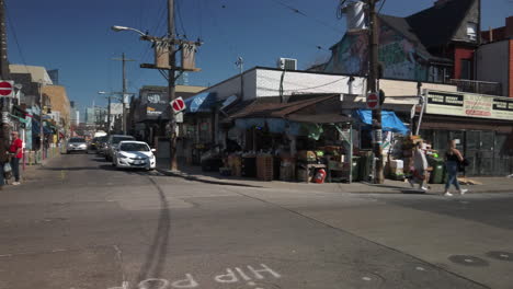 Wide-right-to-left-panning-shot-of-the-busy-corner-of-Baldwin-and-Kensington-in-Kensington-Market