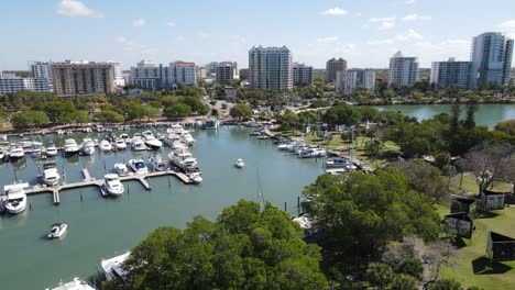 Drone-video-of-beautiful-downtown-Sarasota,-Florida,-the-marina-and-parks-along-the-coastal-waterline