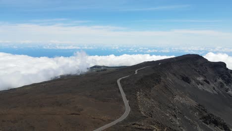 High-Altitude-Road-by-Crater-on-Haleakala-Volcano-Summit-on-Maui-Island-in-Hawaii,-Aerial