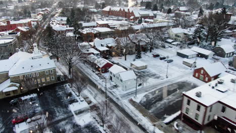 AERIAL-Fresh-Snowfall-Over-The-Streets-Of-Lititz,-Lancaster-County,-USA
