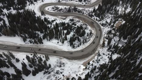 Top-down-view-of-traffic-driving-along-the-switchbacks-of-Highway-9-at-sunset