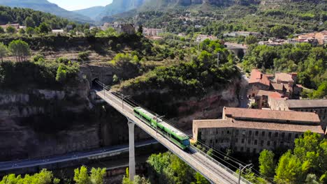 Aerial:-small-rack-railway-across-a-modern-bridge