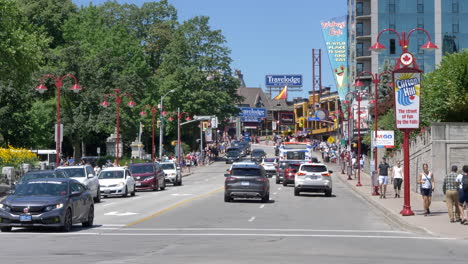 Niagara-Falls-city-scene-with-traffic-and-pedestrians-on-sunny-day