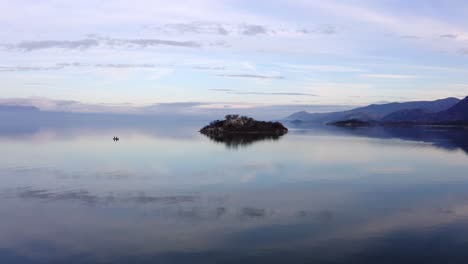 beautiful-view-of-sky-reflected-on-calm-Lake-Skadar-surface-at-morning-hour
