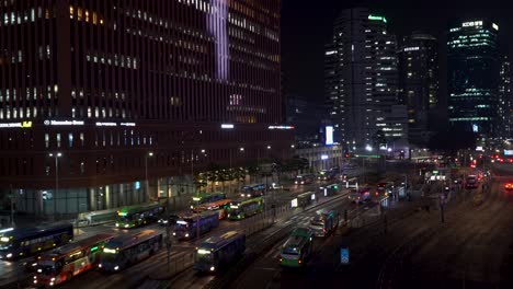 Seoul,-South-Korea-city-scene-at-night-by-the-central-bus-station-establishing-shot