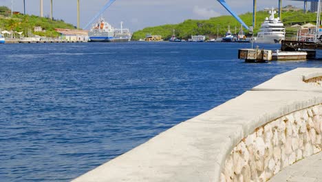 Queen-Juliana-Bridge-over-the-beautiful-Saint-Anna-Bay-in-Punda,-Willemstad,-on-the-Caribbean-island-of-Curacao