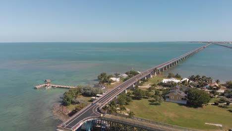 old-seven-mile-bridge-reopened-walking-biking-pigeon-key-florida-travel-tourism-tropical-vacation-aerial-drone-tilt-reveal