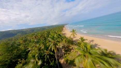 Aerial-drone-fpv-flying-over-Playa-Coson,-Las-Terrenas-in-Dominican-Republic
