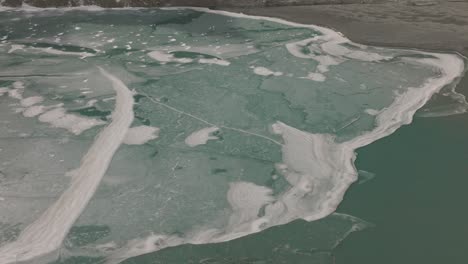 Aerial-shot-of-frozen-lake-at-Attabad-Lake-,-Hunza-,-Northern-area-of-Pakistan