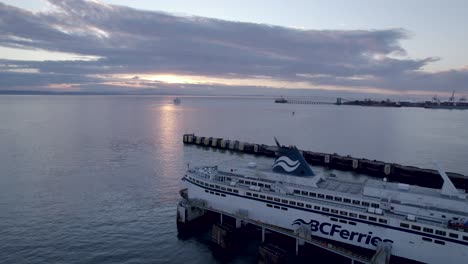 BCferries-ferry-docked-at-Tsawwassen-Vancouver-terminal-at-sunset,-British-Columbia-in-Canada