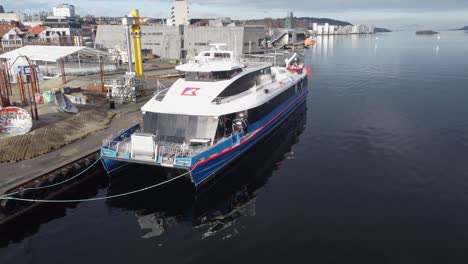 High-speed-passenger-express-boat-named-Rygerdronningen-from-Rodne-company-is-alongside-dock-in-Stavanger-Norway---Aerial