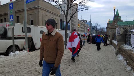 First-person-view-of-truckers-demonstration-for-freedom-with-flags-of-Canada-on-view