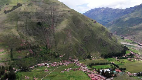 Aerial-View-of-Sacred-Valley-of-Incas-and-Pisac-Village,-Peru---drone-shot
