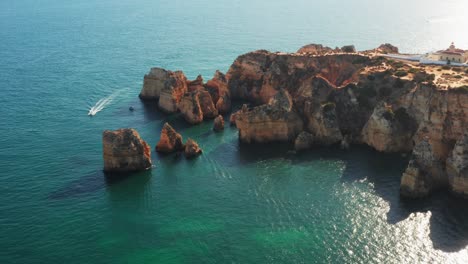 Aerial-shot-of-Ponta-da-Piedade-cliffs-in-the-Algarve,-Portugal
