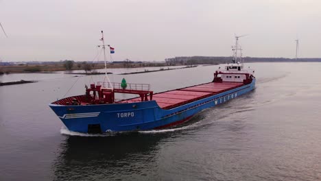 Aerial-Tracking-Shot-Of-Torpo-Cargo-Ship-Off-The-Forward-Bow-Along-Oude-Maas
