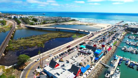 Oceanside-Coast-Drone-Shot-with-Harbor-and-Train-Tracks