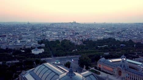 Sunrise-at-Grand-Palais,-Paris,-France,-Revealing-aerial-view-of-City-In-morning