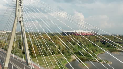 Aerial-drone-view-of-Świętokrzyski-Bridge-and-The-PGE-Narodowy-National-Stadium-in-the-background