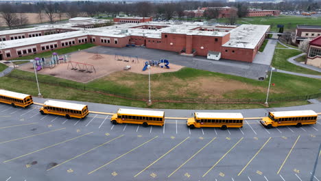 School-bus-line-up-wait-for-students