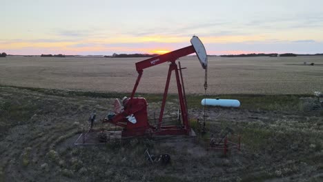 Pumpjack-extracting-crude-oil-in-the-Canadian-prairies-at-sunset