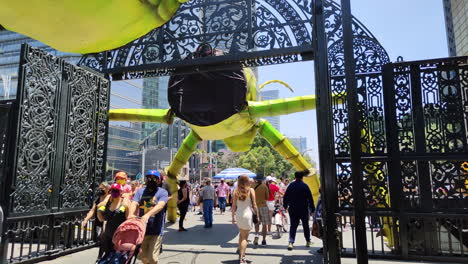 shot-of-people-entering-Bosque-de-Chapultepec-during-spring-festival