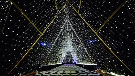 Pyramid-Light-Tunnel,-psychedelic-traveling,-dark,-black-white-swirl-corridor,-night-club-interior,-electronic-led-lightning-golden-experience,-glowing-lines,-futuristic-fluorescent