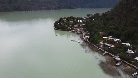 Aerial-view-of-Caleta-Tortel,-an-amazing-village-full-of-wooden-catwalks-in-south-Chile