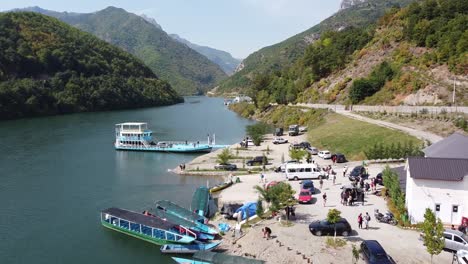 Lake-Koman-Ferry-Terminal-at-Fierze,-Albania---Aerial-View-during-Summer-Holiday