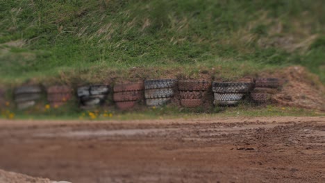 Car-buggy-competition-on-a-gravel-track,-fighting-for-the-first-place-by-participating-in-the-competition