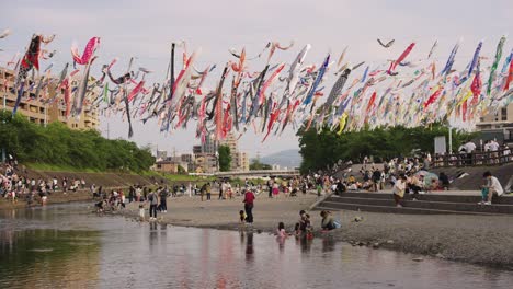 Japanese-People-Gathering-at-Akutagawa-Sakurazutsumi-Park-for-Children's-Day