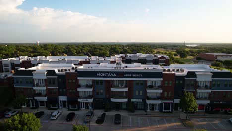 Aerial-footage-of-the-Montana-at-Bowery-Park-apartments-located-at-120-Main-St-Ste-128,-Highland-Village,-TX-75077