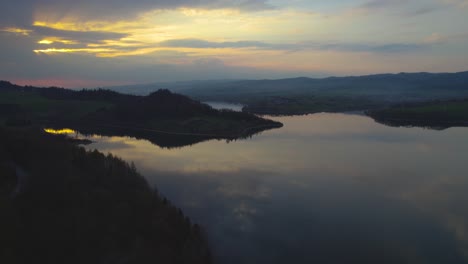 Beautiful-Landscape-in-Poland-of-Lake-Czorsztyn-on-Sunset,-Aerial-Drone-View