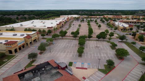 Aerial-footage-of-the-Robertson's-Creek-Shopping-Center-located-at-5801-Long-Prairie-Rd,-Flower-Mound,-TX-75028