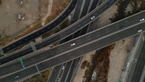 Aerial-view-of-a-highway-intersection-with-some-day-traffic-in-Santiago-city-of-Chile