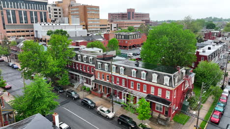 Aerial-rising-shot-of-housing-in-city