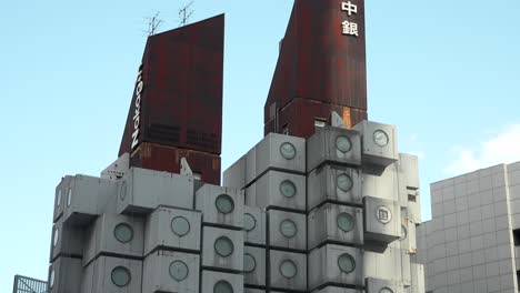 Demolition-works-continue-at-Tokyo's-iconic-Nakagin-Capsule-Tower-in-Ginza-on-April-16,-2022,-in-Tokyo,-Japan