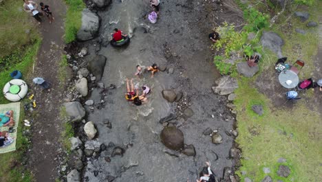 Yogyakarta,-Indonesia---May-26,-2022-:-Top-view-of-people-picnicking-around-the-river-with-cool-view