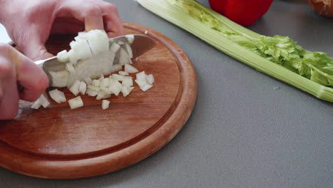 Slow-motion-of-chopping-an-onion-in-tiny-cubes