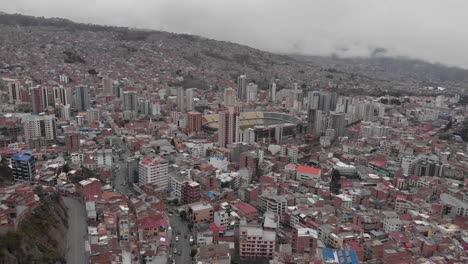 Low-rotating-aerial-over-La-Paz-shows-Olympic-Stadium-Hernando-Siles