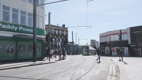 London-tram-passing-through-intersection-in-croydon-old-town