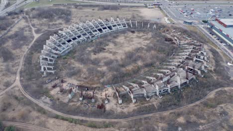 AERIAL:-Reveal-Shot-of-Abandoned-Lithuania-National-Stadium-in-Vilnius