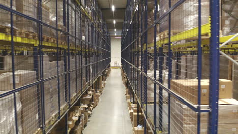 Aerial-Shot-Of-Inside-Distribution-Warehouse,-International-Parcel-Delivery-Industry